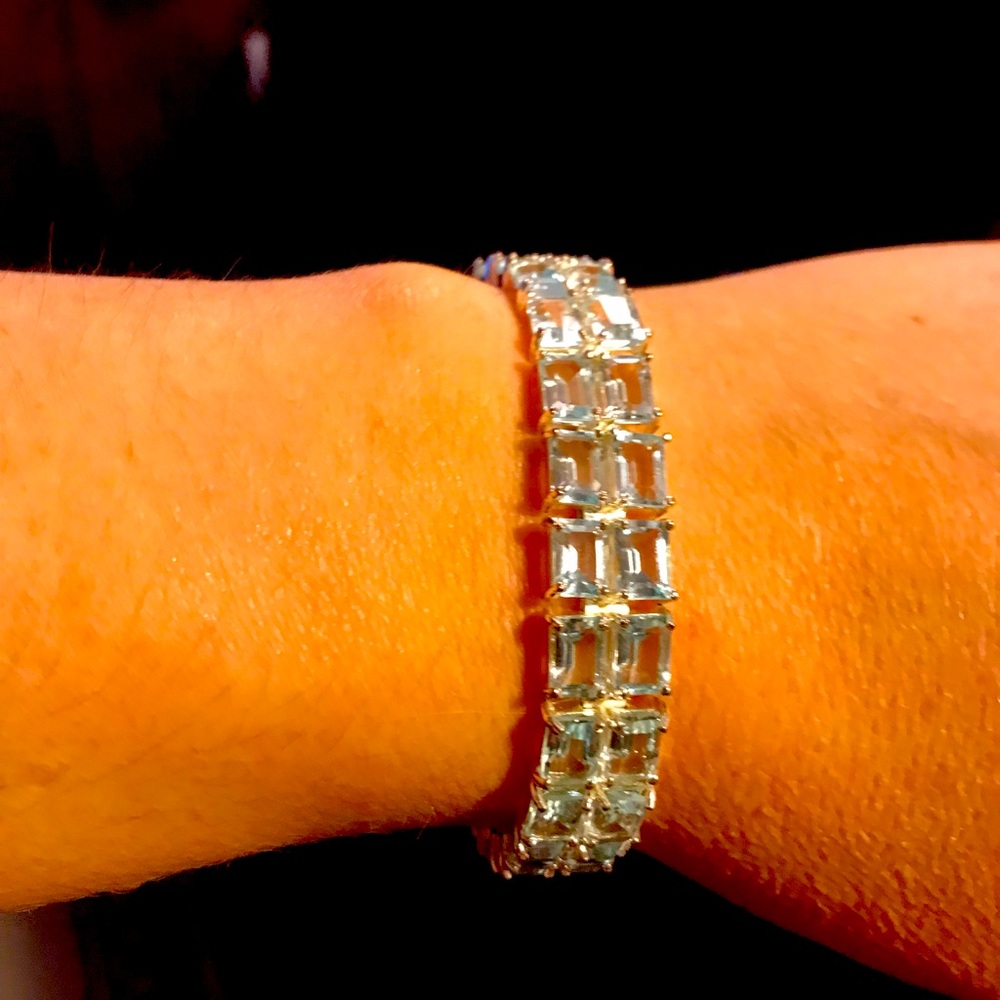Costume jewelry light baby blue diamonds.